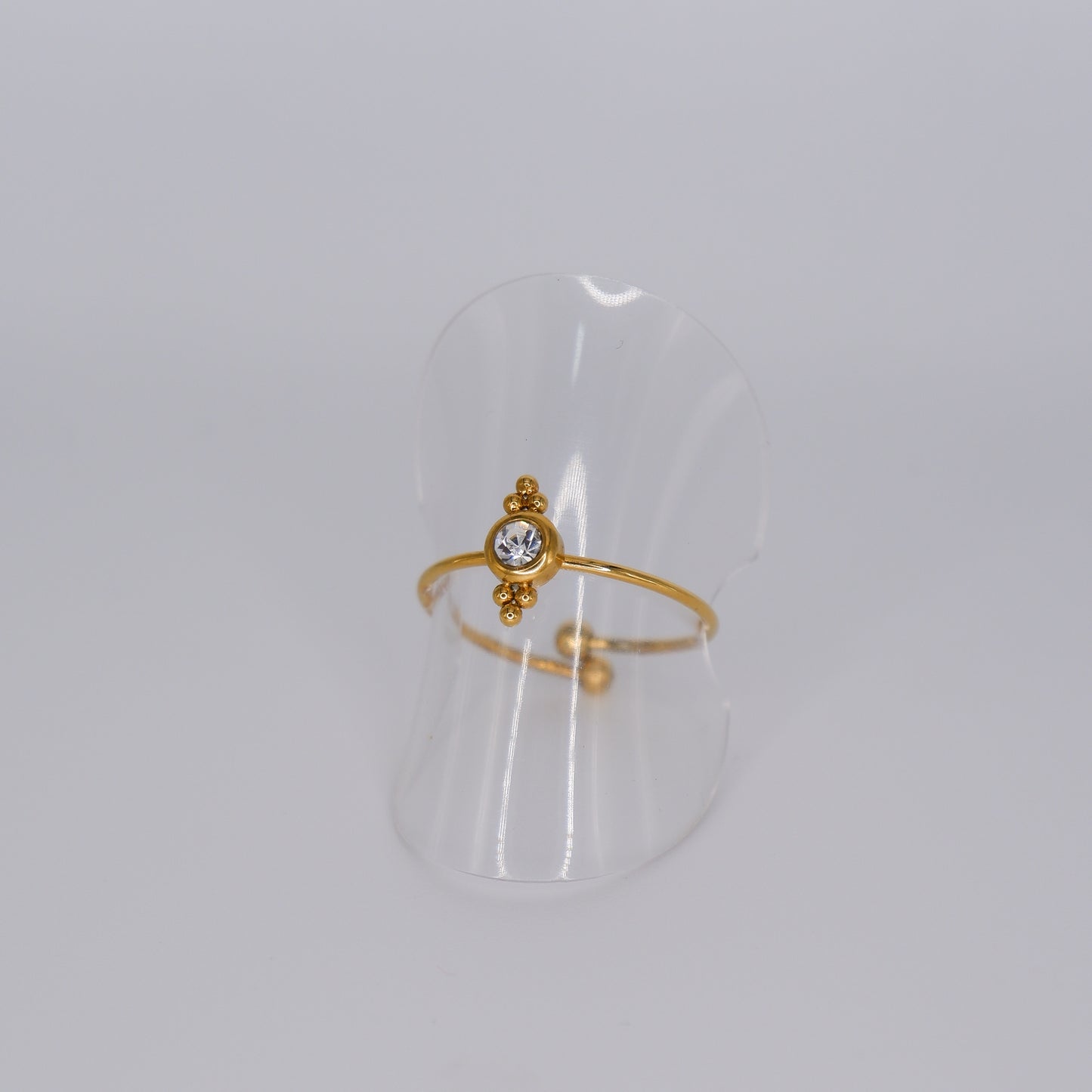 Anel Ajustável Dourado com Pedra Transparente