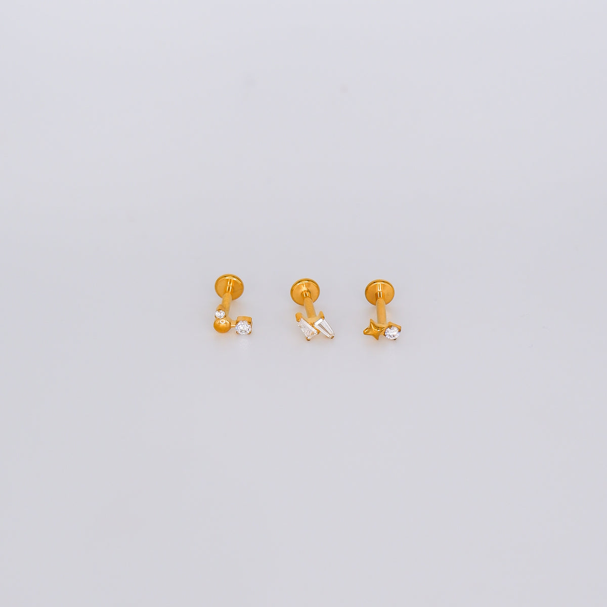 Piercing Achatado 3 Bolas, 2 Riscos e Estrela com brilho