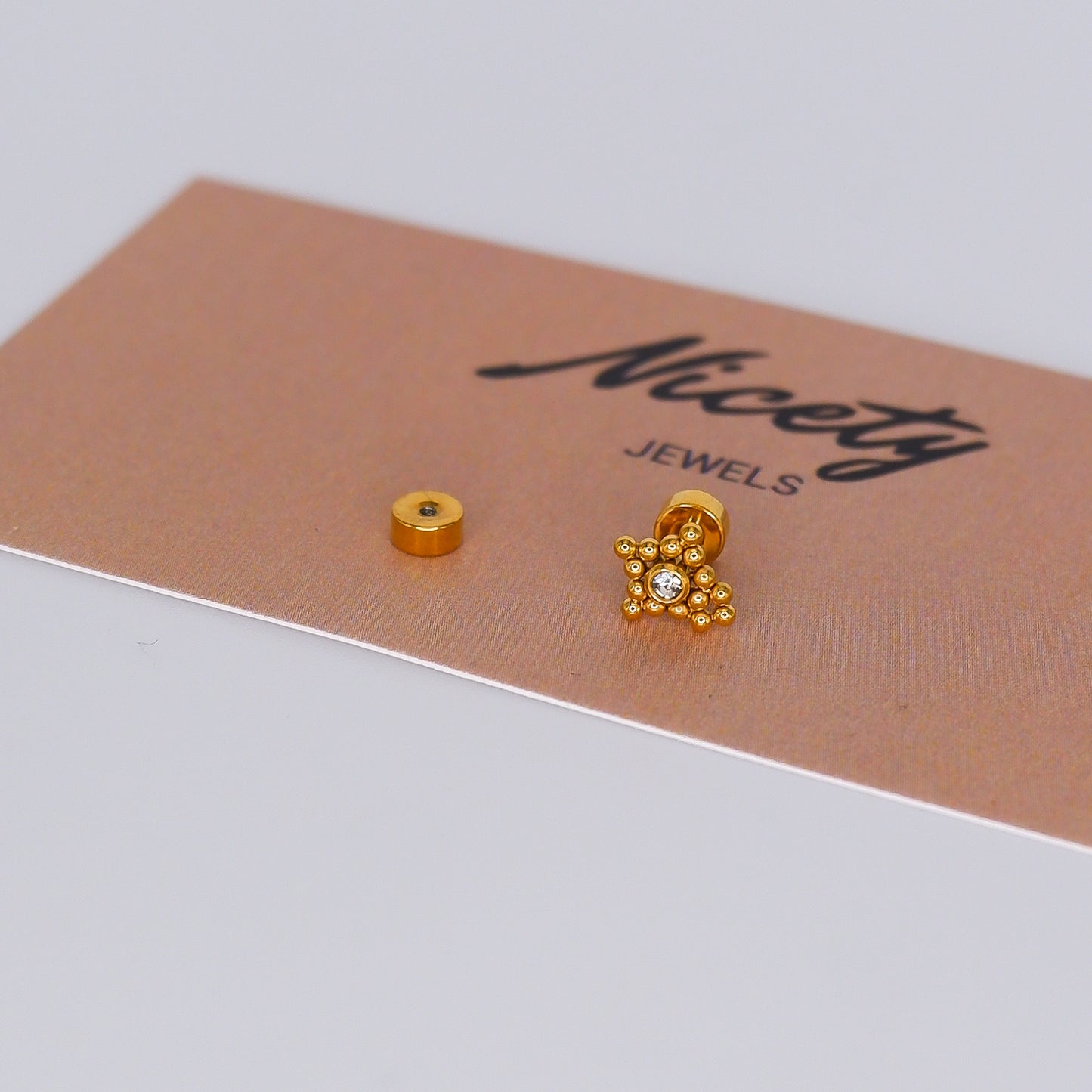 Piercing aperta atrás