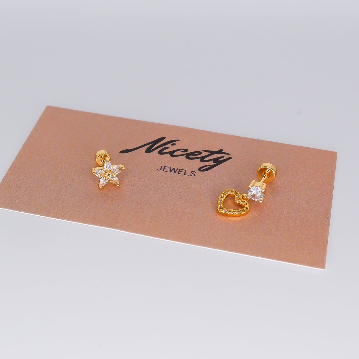 Piercing aperta atrás Flor e Coração