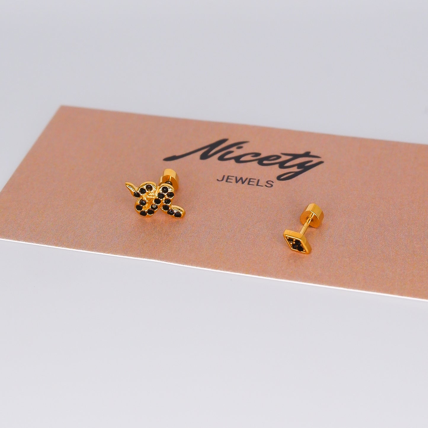 Piercing aperta atrás Cobra e Losango Preto