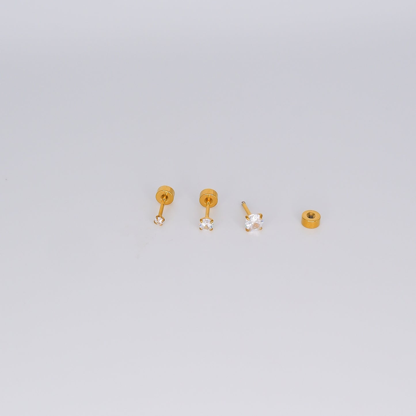 Piercing Aço Inoxidável 3 tamanhos Ponto Luz Dourado