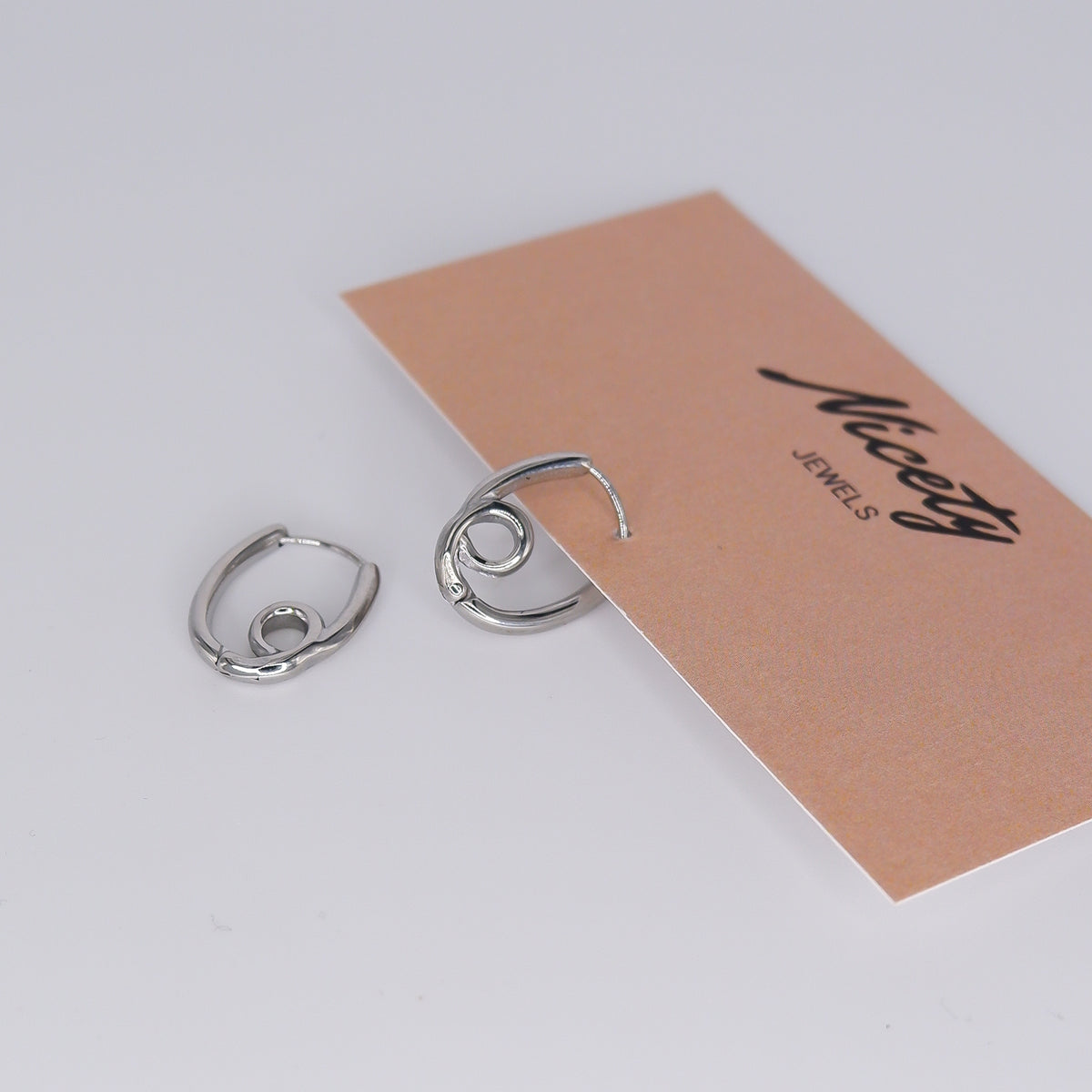 Argola Aço Prateada Enrolada