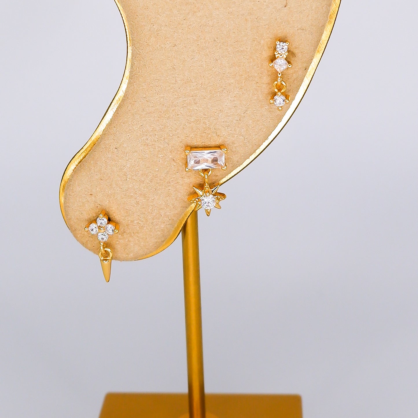Piercing Bolinha Flor, Estrela e Brilhos Pendente