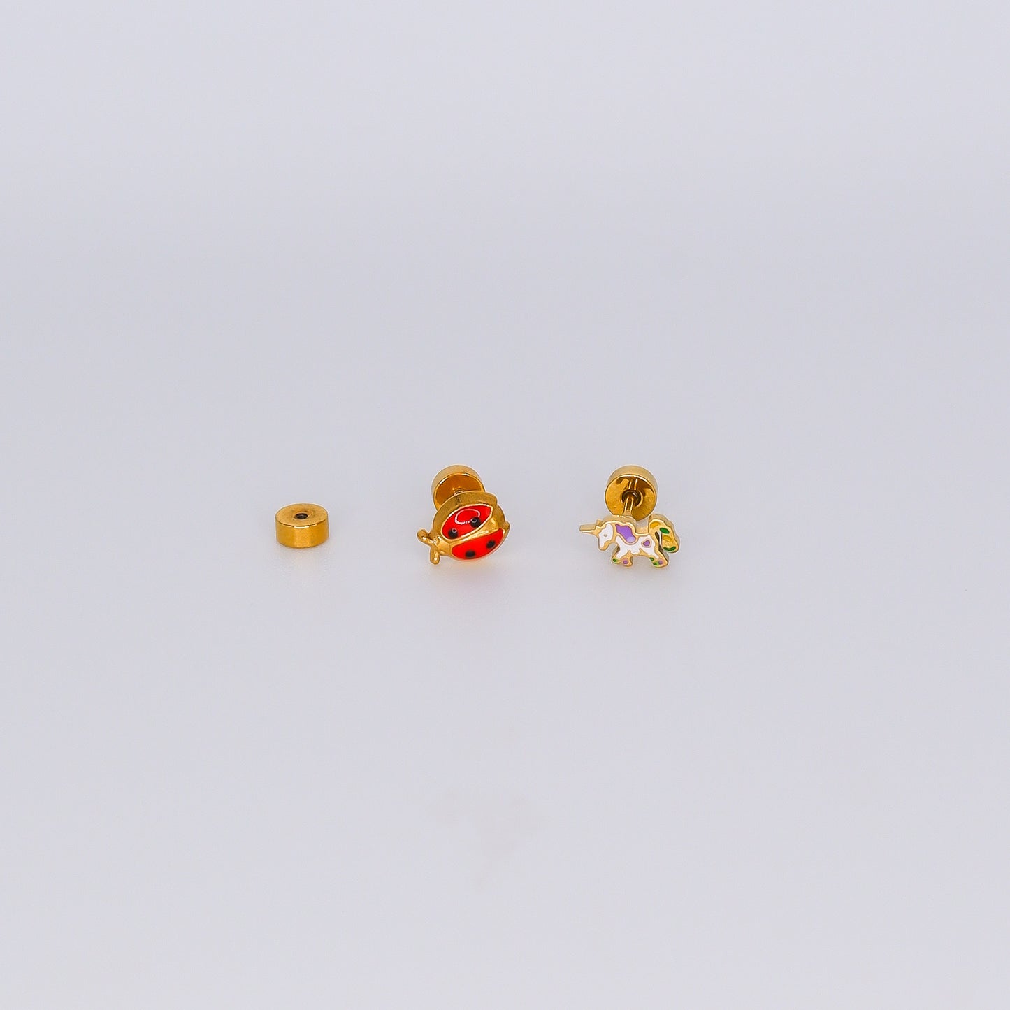 Piercing aperta atrás Joaninha e Unicórnio