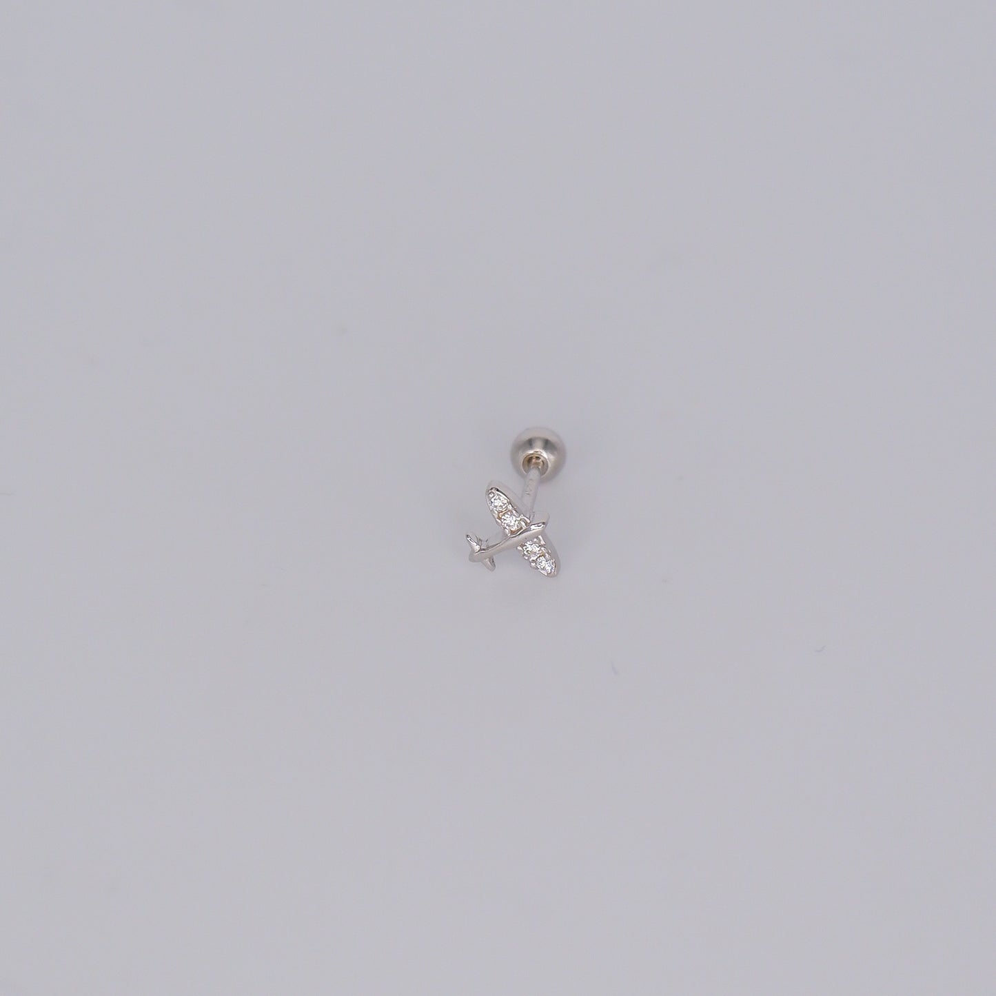 Piercing Bolinha Prateado Avião