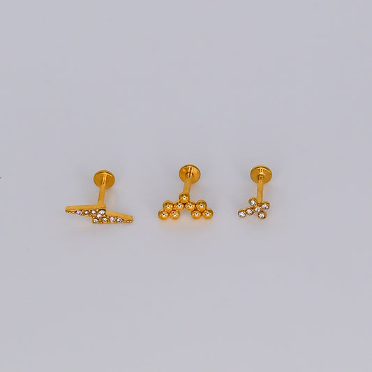 Piercing Achatado Raio, Bolas e Cruz