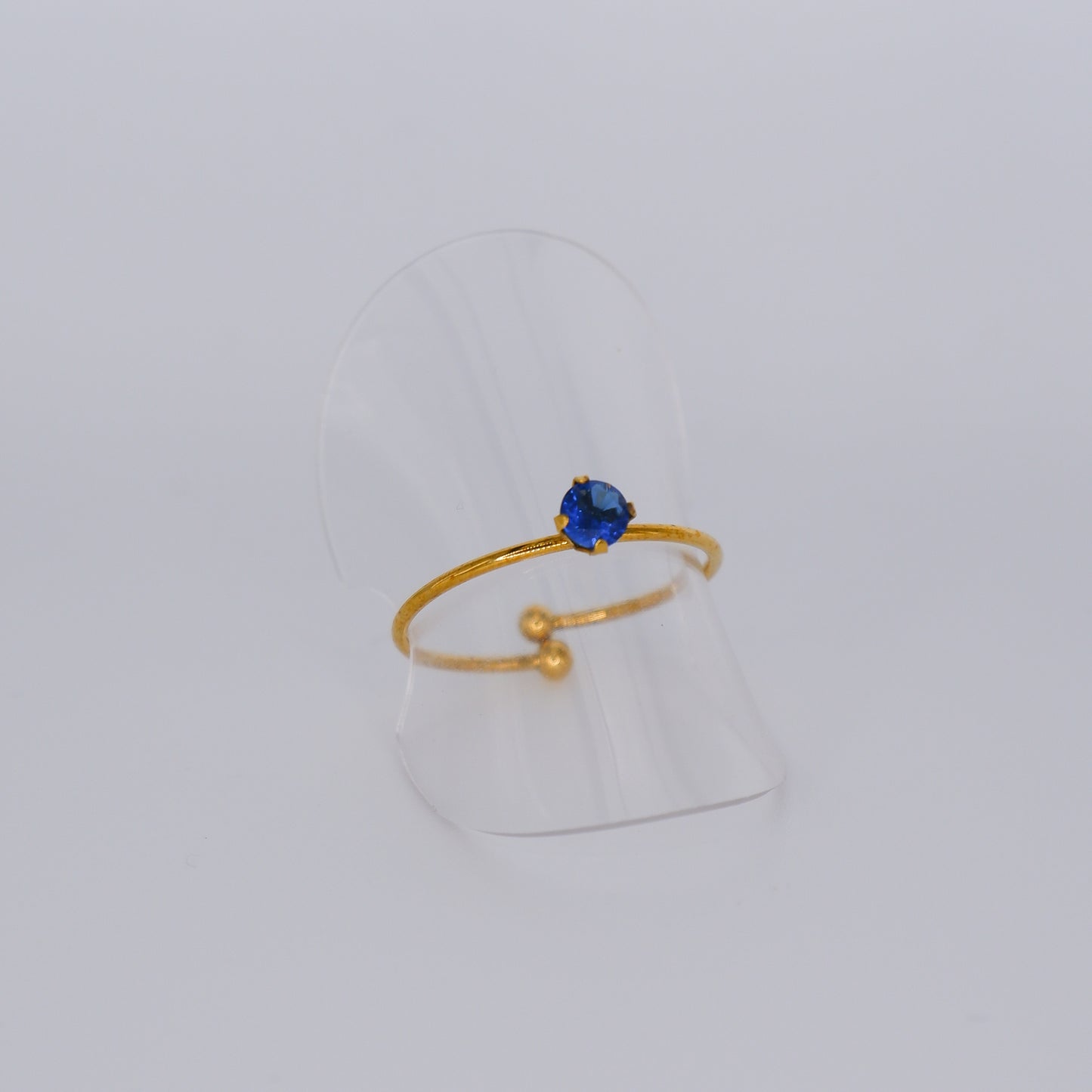 Anel Ajustável Dourado Ponto Luz Azul