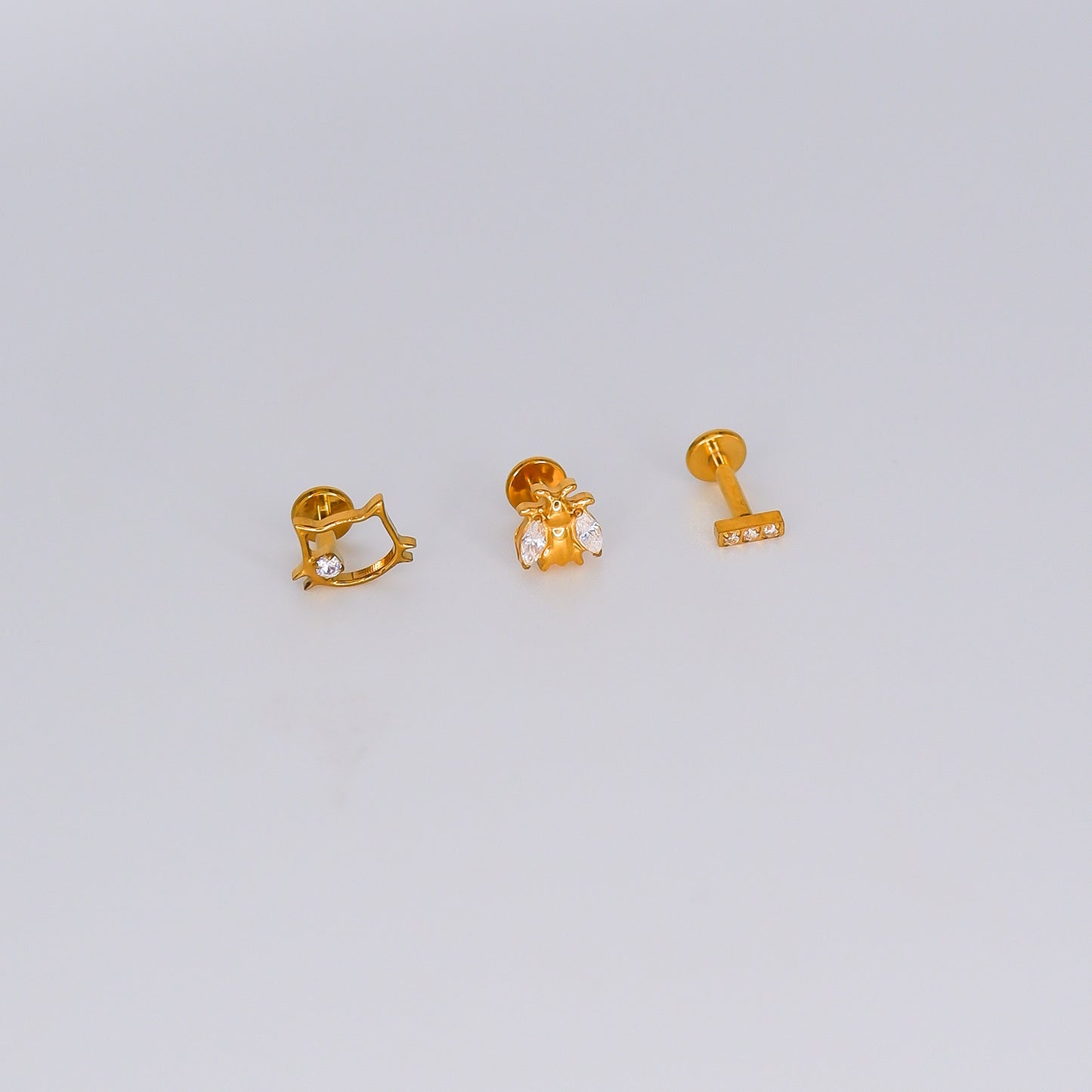 Piercing Achatado Kitty, Abelha e Risco