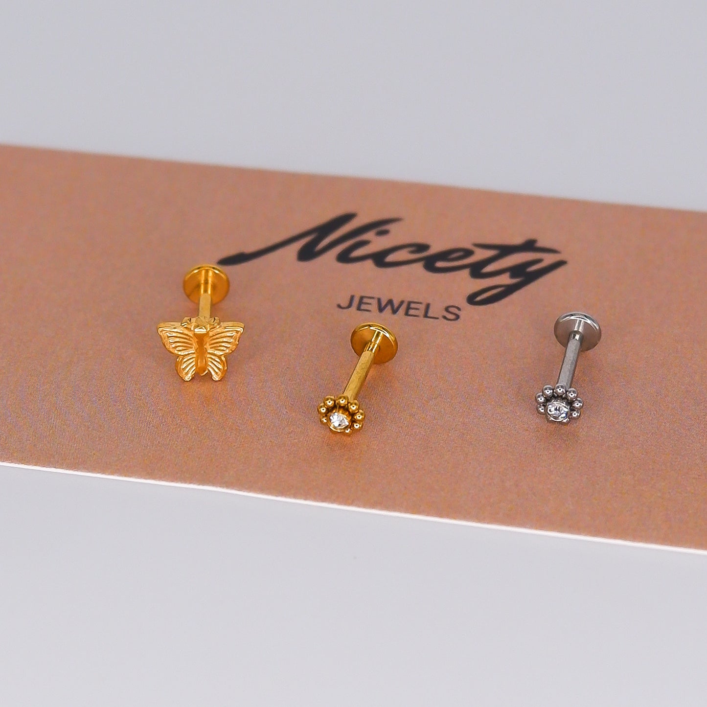 Piercing Achatado Borboleta e Sol