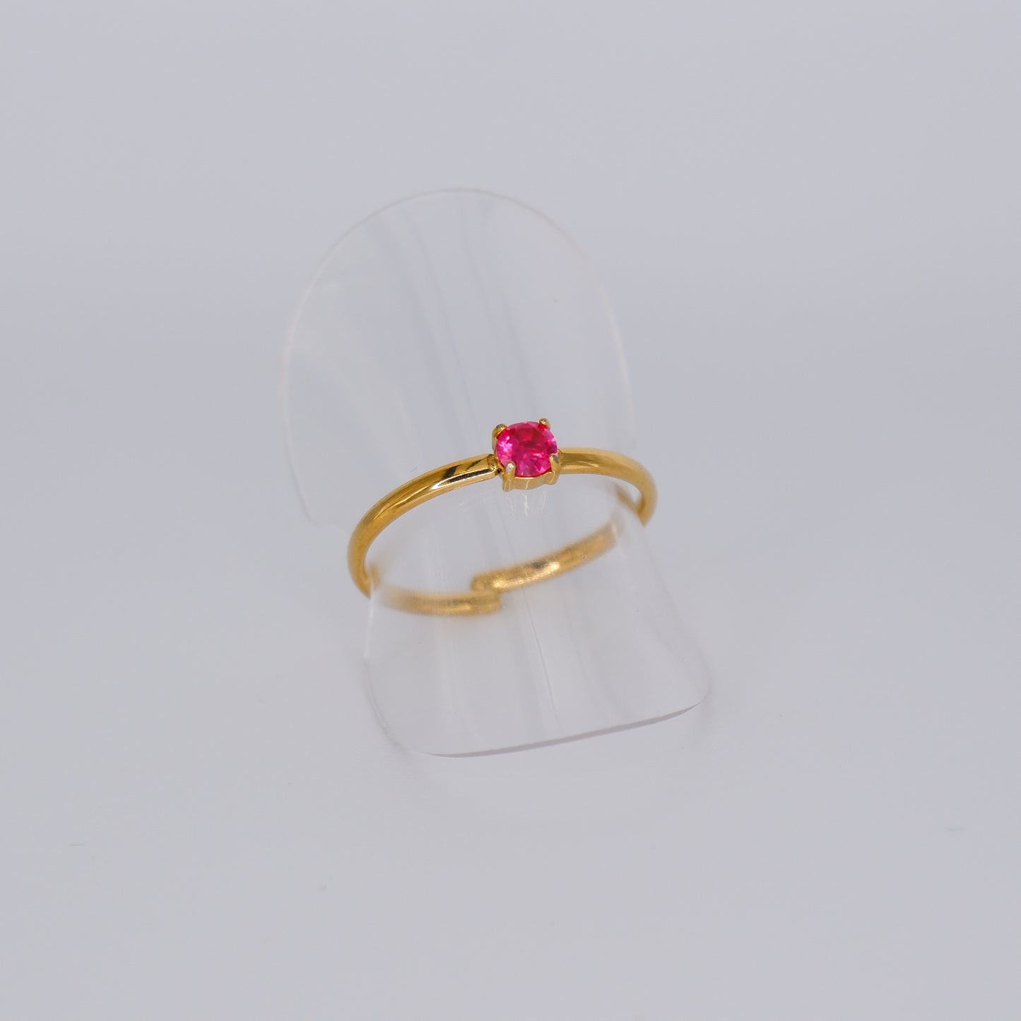Anel Ajustável Dourado Ponto de Luz Rosa