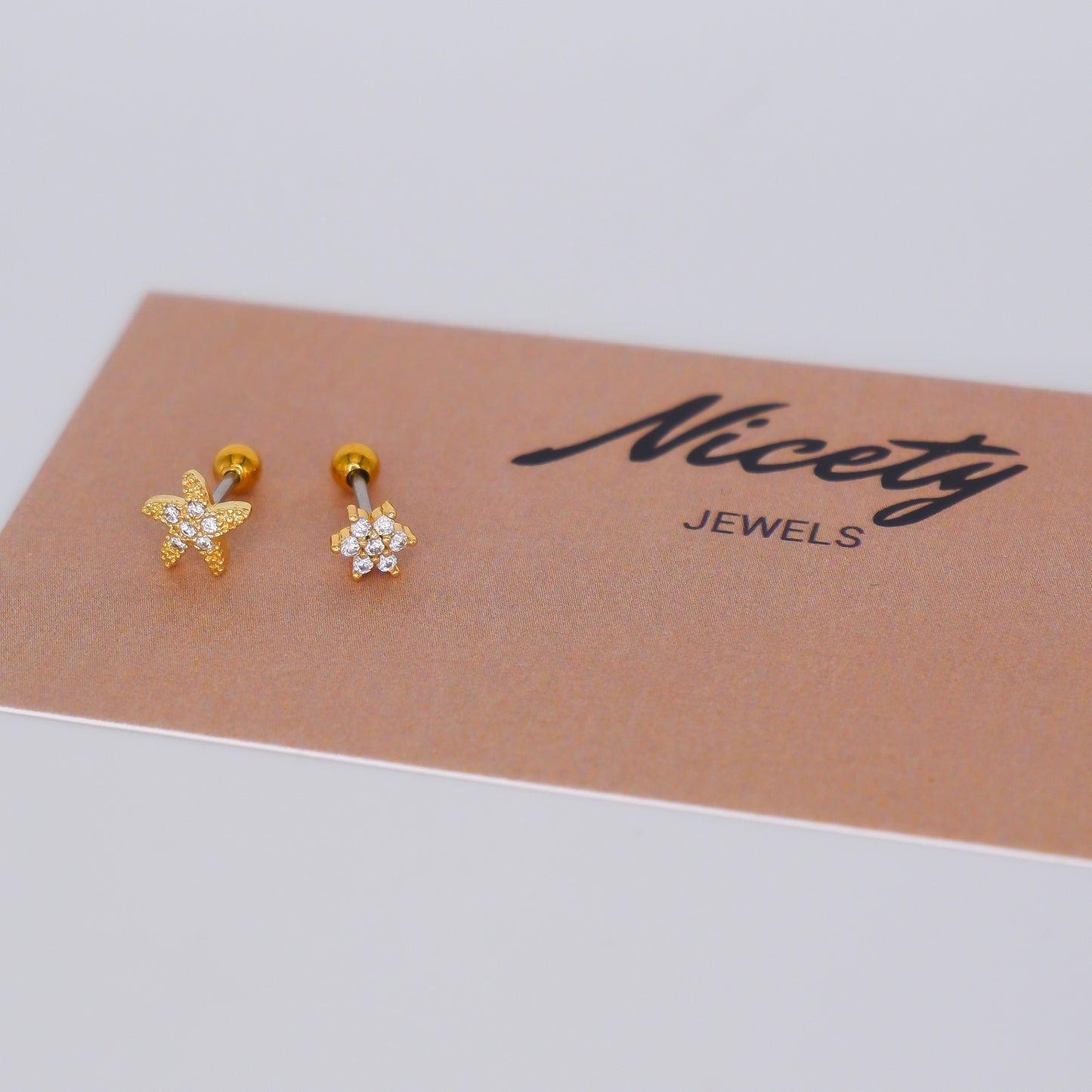 Piercing Bolinha Aço Inoxidável Estrela e Flor